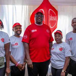 The Multilines team proudly poses alongside Mumba Keneth Kalifungwa, Absa MD, after completing the Absa KH3 7 Hills Run.